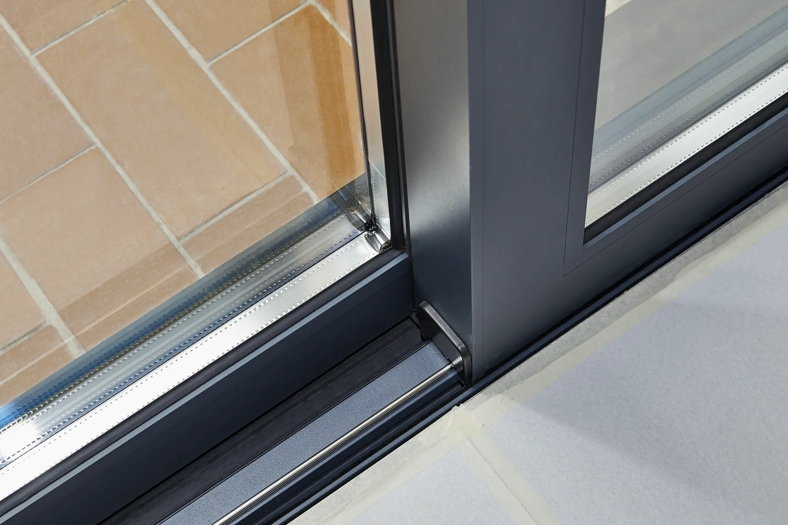 Detail of a modern sliding door installation showcasing sleek design and precision