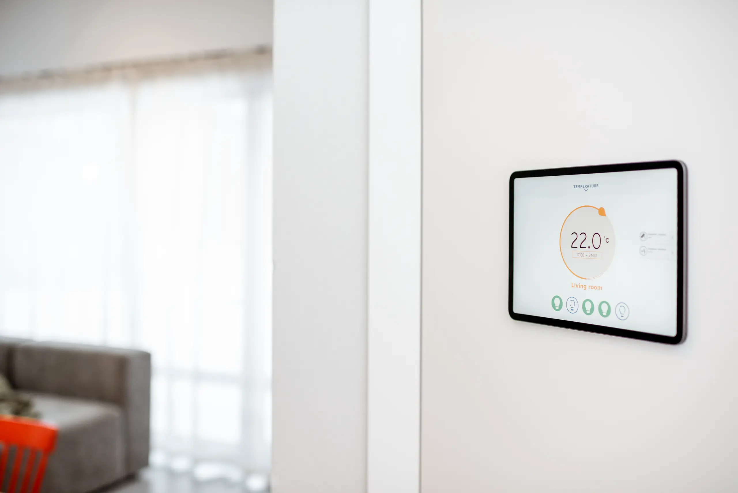 Smart home control panel displaying temperature settings for optimal comfort