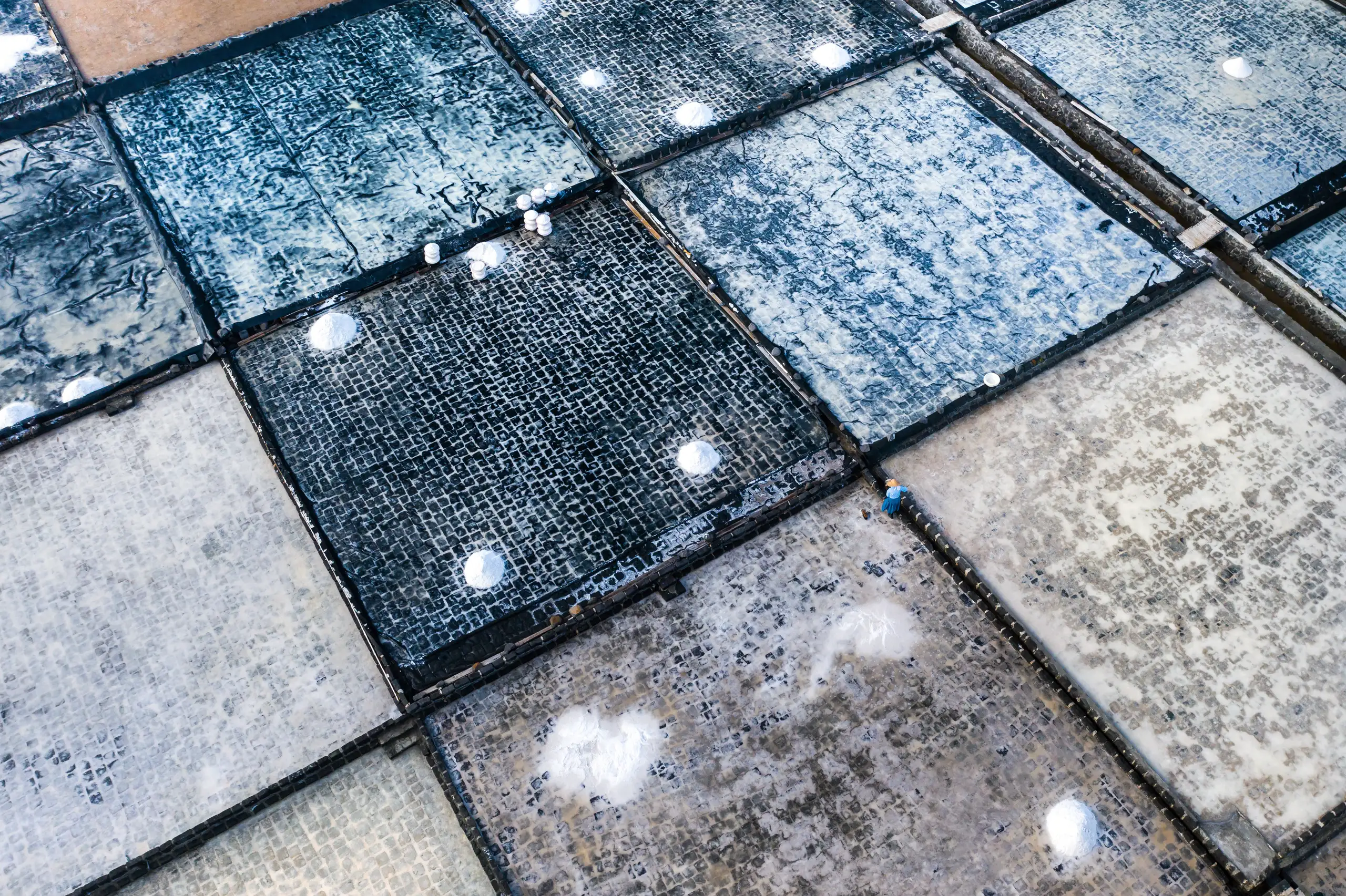 Close-up of various stone worktops showcasing different textures and colors for kitchen refurbishment