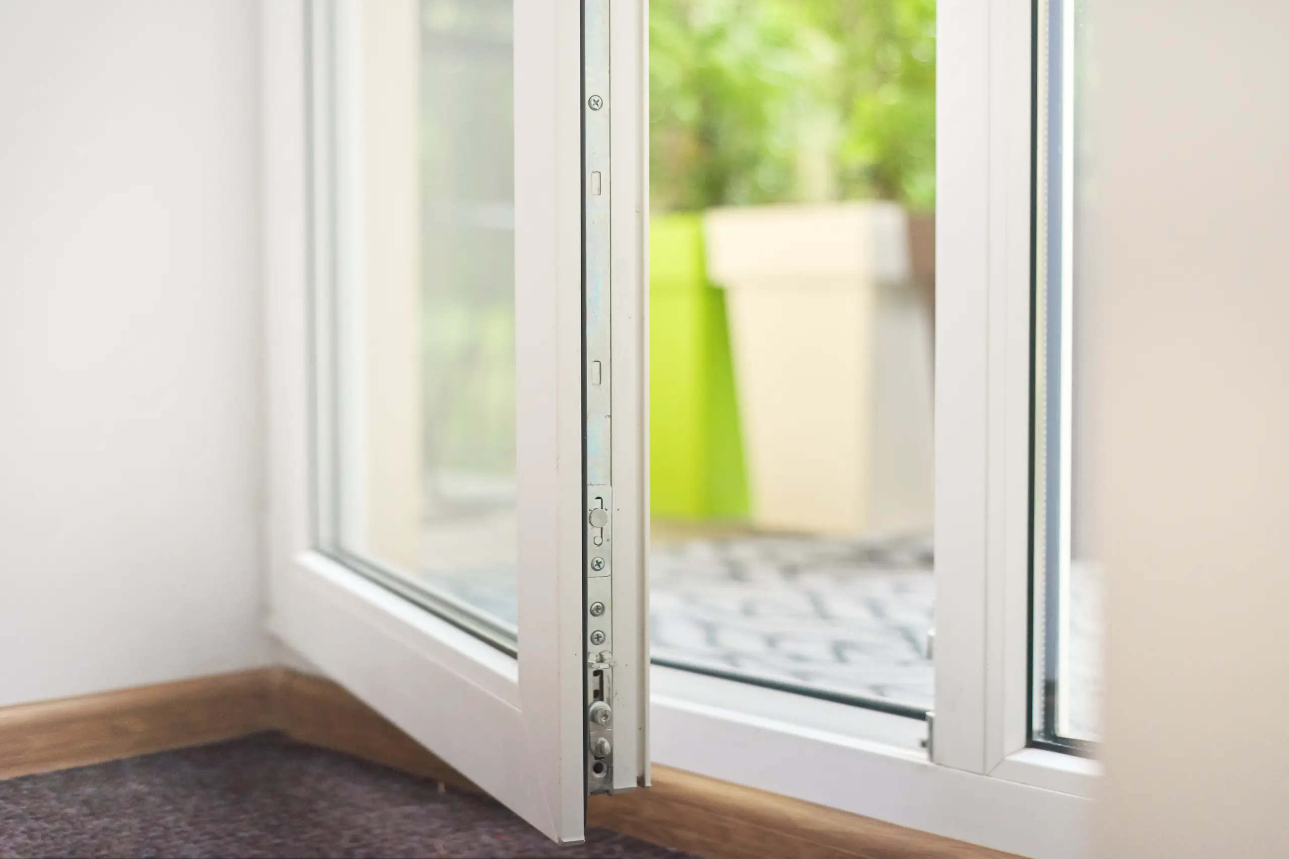 Close-up of a sliding door installation showcasing high-quality uPVC frames